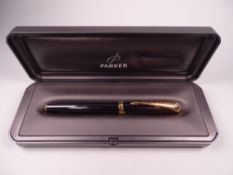 Modern (2000 - 2002) black Parker Ellipse fountain pen, with 23ct gold plated trim and 18ct gold