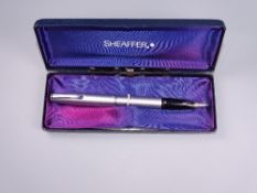 Modern Black Lacquer Sheaffer Agio Compact fountain pen and ballpoint pen set. Modern Brushed chrome