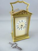 AN ARCHITECTURAL BRASS CASED CARRIAGE CLOCK, late 19th Century with later changes, 15.5 cms high