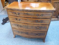 A NEAT GEORGIAN MAHOGANY BOW FRONT CHEST OF FOUR DRAWERS having boxwood and satinwood crossbanding