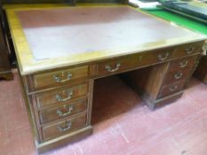 A CIRCA 1900 MAHOGANY PARTNER'S DESK with inset red leather top, 75.5 cms high, 151 cms wide, 121.