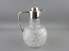 A FINE CUT GLASS GLOBULAR WINE OR WATER JUG with silver handle, collar and hinged lid, Birmingham
