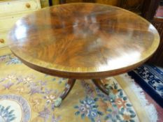 A MAHOGANY TILT TOP BREAKFAST TABLE with segmented veneer top, 120 cms diameter, 73.5 cms high