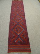Meshwani runnerred ground with repeating central diamond pattern 270 x 65cms