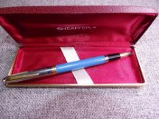 Vintage Pale Blue Sheaffer Snorkel Sentinel fountain pen with lined steel cap and gold plated trim