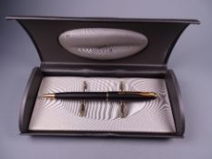Modern (from 1990s onwards) matt black Parker Sonnet ballpoint pen with gold plated trim, in