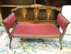 AN EDWARDIAN IVORY INLAID MAHOGANY SALON COUCH with triple vase splatback, 80 cms high, 107 cms