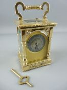 R & CO, PARIS BRASS CASED CARRIAGE CLOCK with repeating gong strike mechanism and arched front and