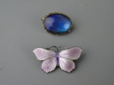 A SILVER & ENAMEL BUTTERFLY BROOCH with a butterfly wing brooch, the former stamped 'J A & S',