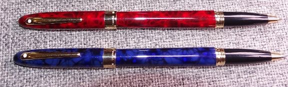 2 modern Flame Red and Ultramarine Blue Sheaffer Crest (reissue) roller ball pens in laqu
