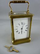 A FRENCH BRASS CASED CARRIAGE CLOCK BY HENRI JACOT, trademark stamp to the backplate, no. 4260, 17
