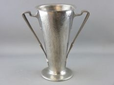 AN ARCHIBALD KNOX DESIGN (0971) TWIN HANDLED BEATEN ENGLISH PEWTER VASE, 25.5 cms high