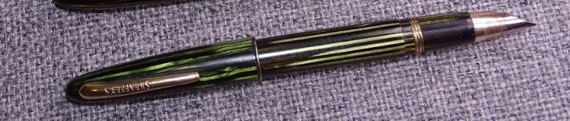 Vintage Green sriated Sheaffer Triumph Admiral II fountain pen with gold trim and vac-filling