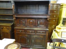 AN 18th CENTURY OAK WELSH TRIDARN, the hooded top having turned and block pillars to a centre having