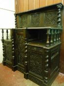 A CARVED OAK INVERTED BREAKFRONT SIDEBOARD with upper panelled back, 137 cms high, 129 cms wide,