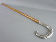 A 20th CENTURY SILVER HANDLED WALKING CANE, patterned in the form of a fox with pheasant kill,