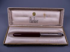 Vintage burgundy Parker 51 fountain pen with Lustraloy cap with chrome plated clip, in original box