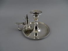 A GEORGE III SILVER CHAMBER STICK & SNUFFER with removable sconce, London 1785, 8.4 troy ozs, 14 cms