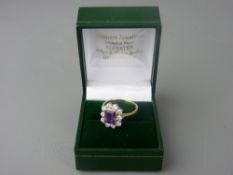 AN EIGHTEEN CARAT GOLD DIAMOND & AMETHYST SET RING, 5.3 grms gross, size mid 'P to Q'