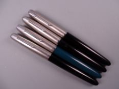 Four Vintage Parker 51 fountain pens (three black, one teal)