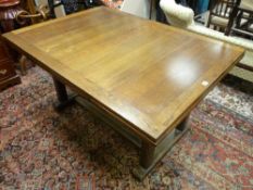 A LARGE POLISHED DRAW LEAF DINING TABLE