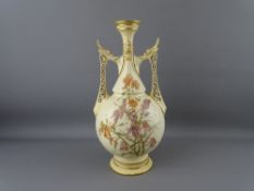 A ROYAL WORCESTER 1071 PATTERN TWIN RETICULATED HANDLED VASE having floral sprays in gilt relief,
