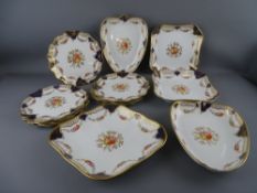 A TWELVE PIECE WEDGWOOD 'PANDORA' DESSERT SET comprising 29.5 cms diamond shaped dish, a pair of
