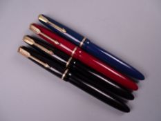 Four Vintage Parker Slimfold fountain pens (two black, one blue, one red), all with 14k nibs