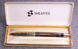 Vintage Brown striated Sheaffer Crest fountain pen with GF cap and 14k gold Lifetime nib. Name