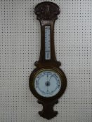 A VINTAGE OAK BANJO WALL BAROMETER WITH THERMOMETER, 88 cms long