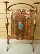 AN ARTS & CRAFTS COPPER FIRESCREEN with Ruskin type pottery decoration within stylized flowers, 78