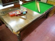 A 7ft 6ins RILEY SNOOKER/DINING TABLE, 75 cms high (lowered position), 118.5 cms long (boards on)