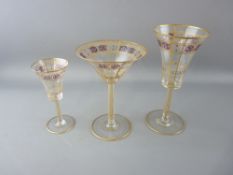 A GOOD ART NOUVEAU STYLE DECANTER & DRINKING GLASS SUITE having a gilt line and McIntosh style