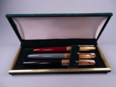 Three vintage Parker 51 fountain pens (black, navy grey, burgundy), each with 12ct rolled gold