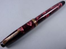 Vintage red marble Parker Challenger Junior fountain pen with button filler and gold plated trim (