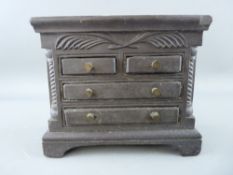 A 19th CENTURY WELSH SLATE FOLK ART CHEST of fully opening drawers, 15 cms high, 17.5 cms wide, 8