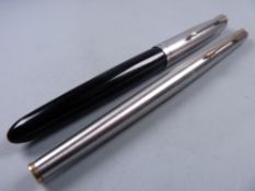Vintage black Parker 51 fountain pen with steel cap and a Vintage stainless steel Parker 180