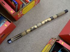 'Didgeridoo' and a pair of treen trays