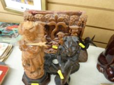 Parcel of four Oriental carvings