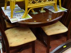 Neat reproduction circular topped dining table and four chairs