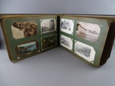Album containing comprehensive collection of vintage postcards