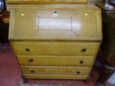 Light oak bureau with three base drawers
