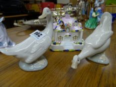 Two Nao geese and a Coalport country cottage