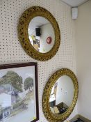 Two gilt framed convex wall mirrors