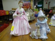 Royal Doulton figurine 'The Hostess of Williamsburg' HN2209 and a Leonardo seated clown