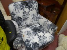 Modern armchair with grey leaf upholstery
