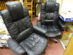 Pair of black vinyl swivel office chairs on chrome bases