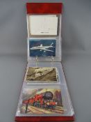 Single album collection of vintage postcards covering marine, air and rail travel
