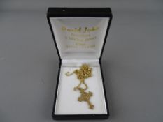 Nine carat gold crucifix and chain, 7.3 grms