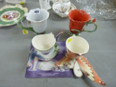 Four items of Franz porcelain